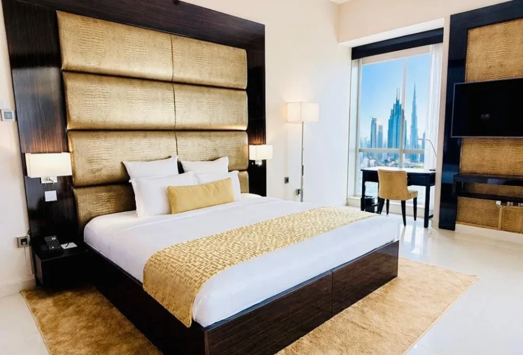 Deluxe Partial Burj Khalifa View room with king bed and skyline window, Gevora Hotel