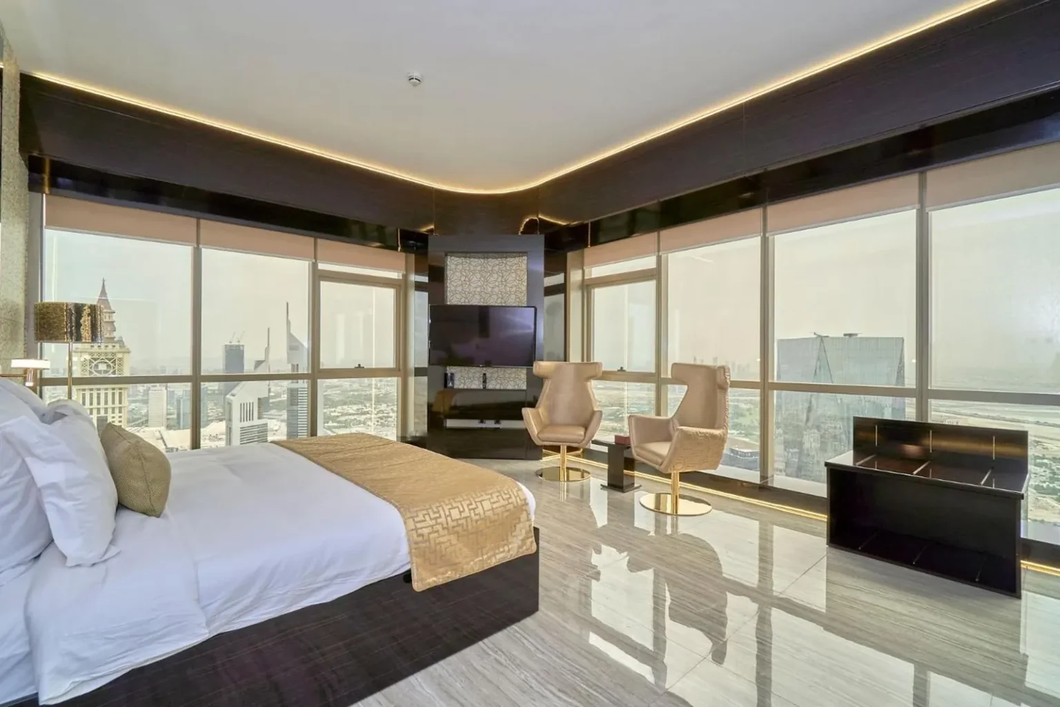 5 Bedroom Penthouse Suite bedroom with panoramic windows over Dubai, Gevora Hotel