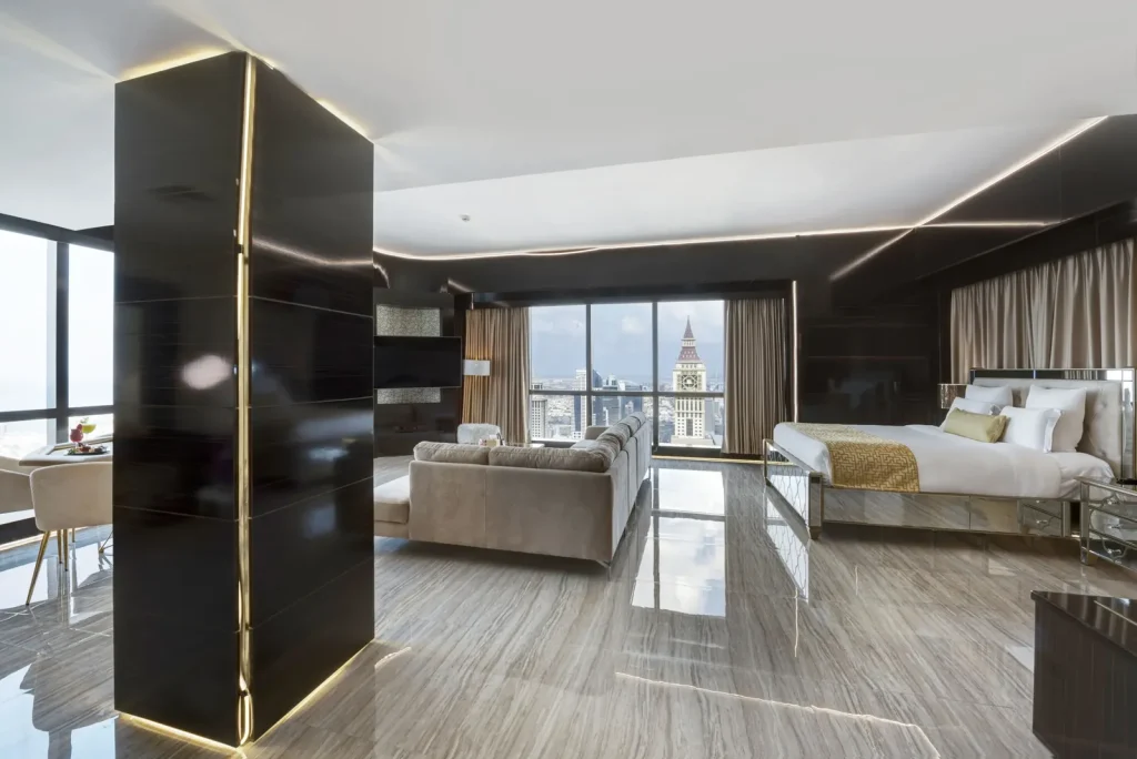 Open-plan living area of the Penthouse Suite with city views, Gevora Hotel