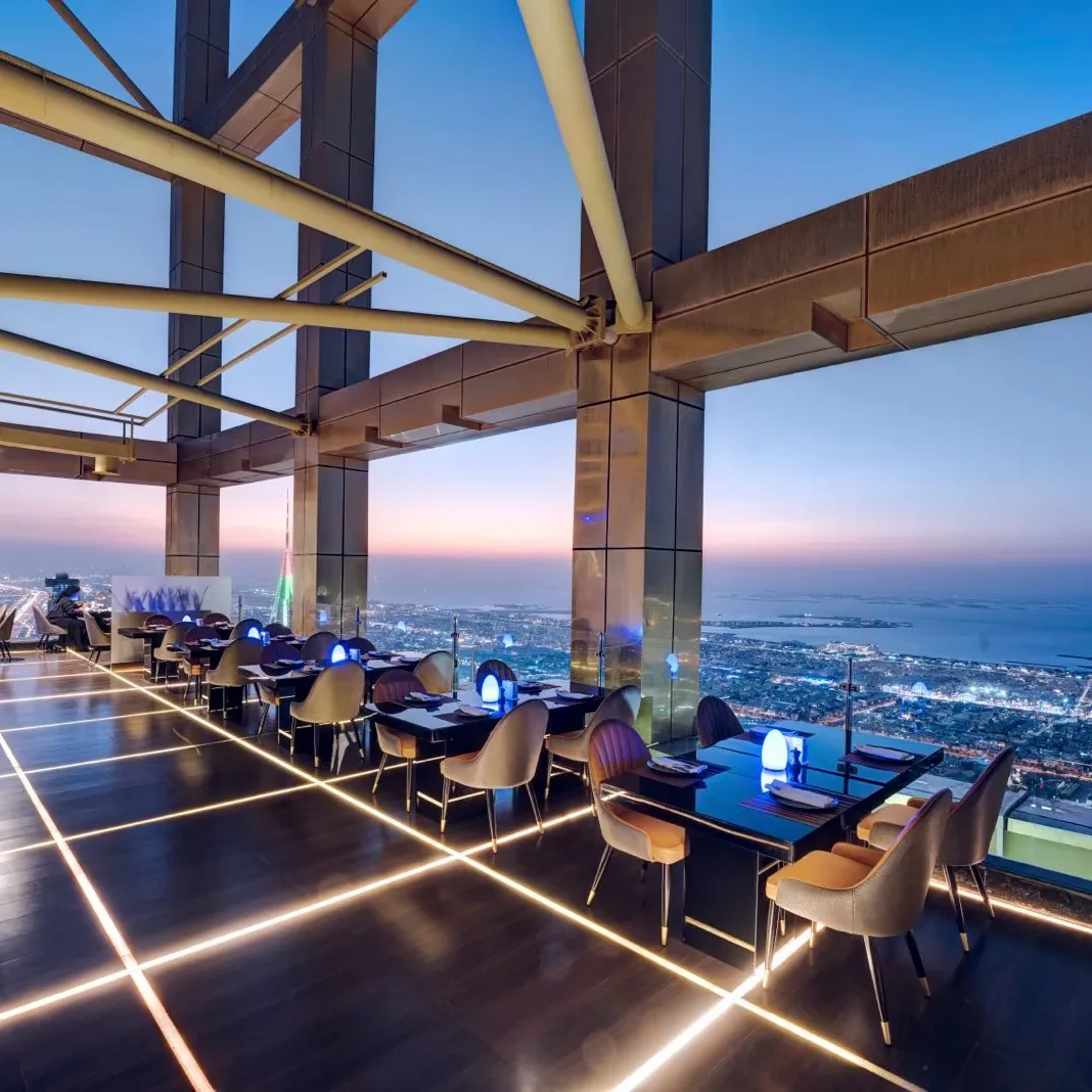 Highest View Lounge & Restaurant rooftop terrace at dusk with city and sea views, Gevora Hotel Dubai
